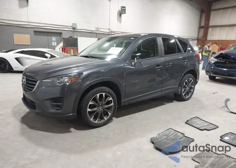 2016 Mazda Cx-5 Grand Touring z USA, uszkodzony, nr VIN JM3KE4DY3G0655577